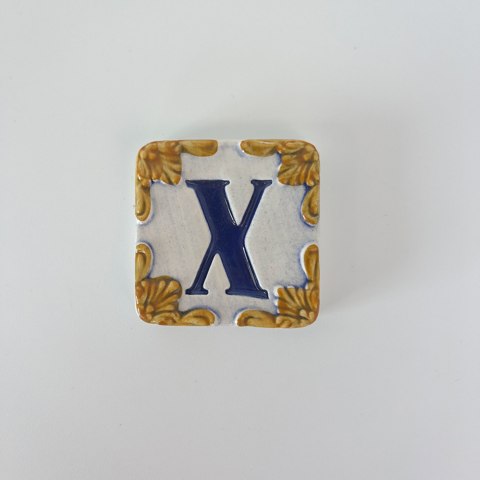 Ceramic door number and letter tile