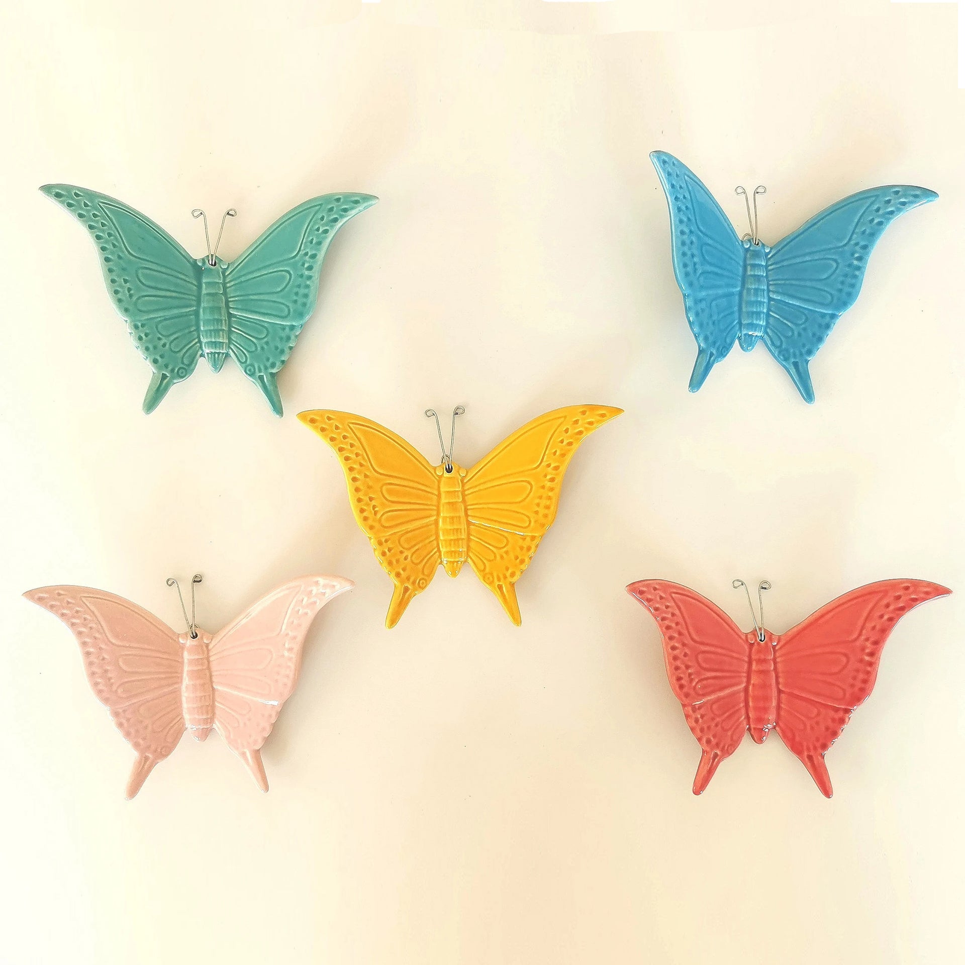 Ceramic small butterfly pink color